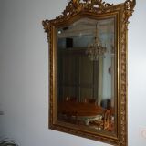 Miroir en bois stuqué doré XIXème siècle 92x142cm