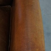 Sheepskin wing chair + XXL patinated footrest