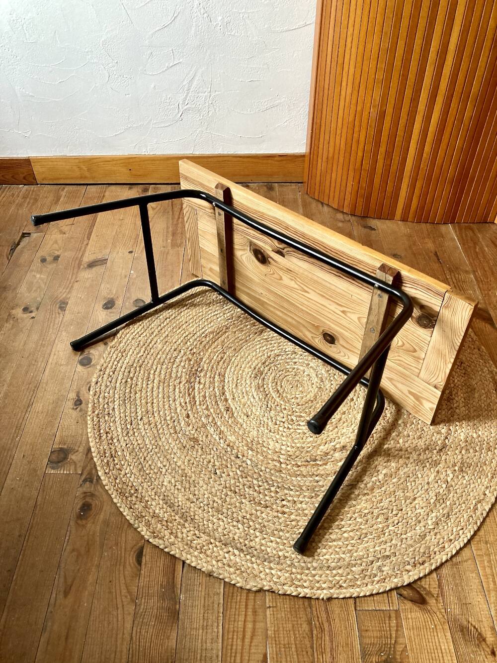 Coffee table with a pine top, tubular metal base, 1950s.