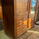 Antique Parisian wardrobe with mirror, hanging space and drawers.