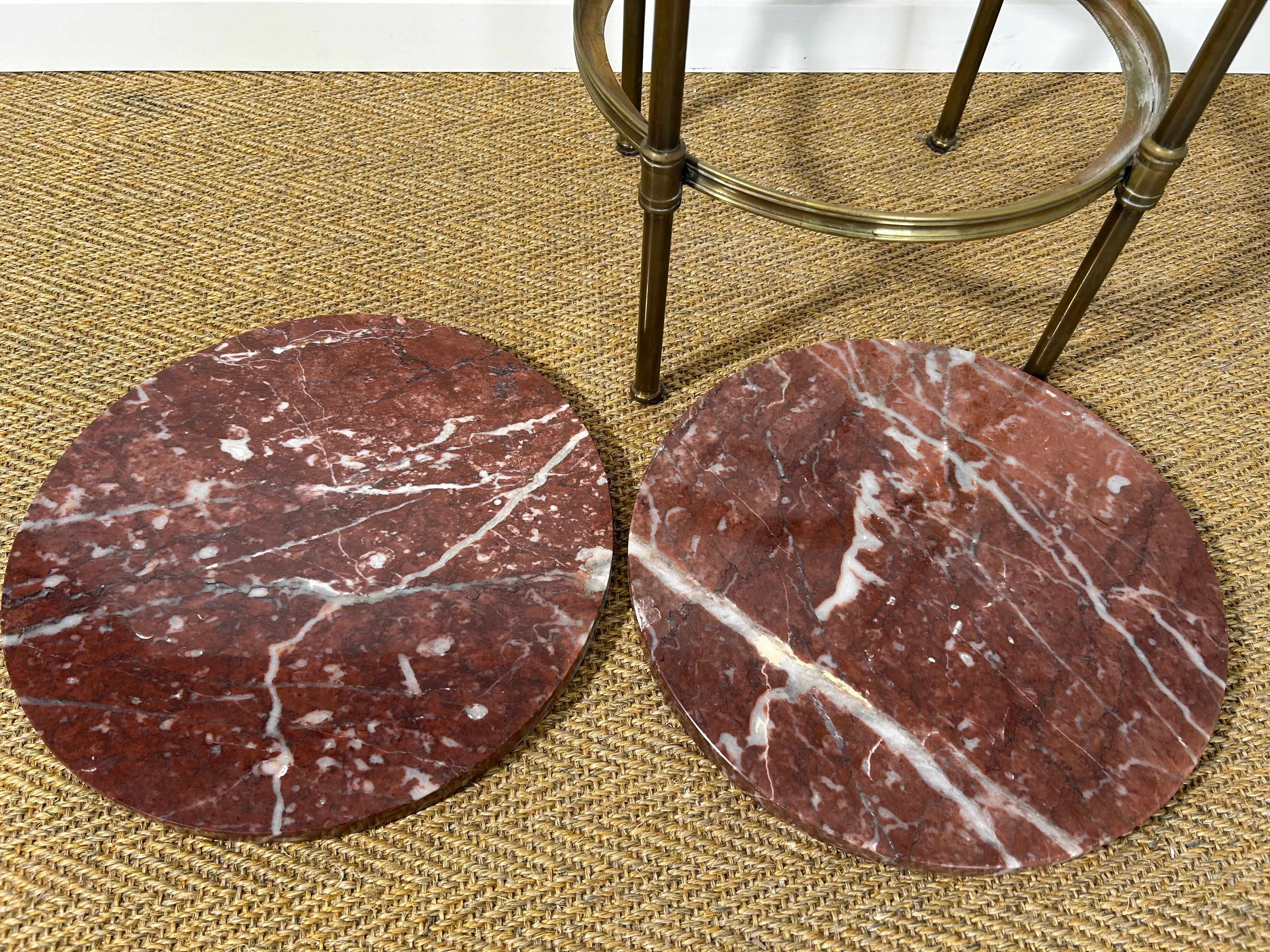Two-tiered gueridon in Emperador marble on a brass structure, 1970s.