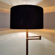 Articulated floor lamp in brass with a velvet shade, 1970.
