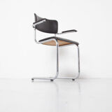 Tubax cantilever chair with black armrest