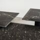 Set of 3 marble and lacquer coffee tables, 1970s.