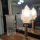 Table lamp with brass base and vintage flame globe