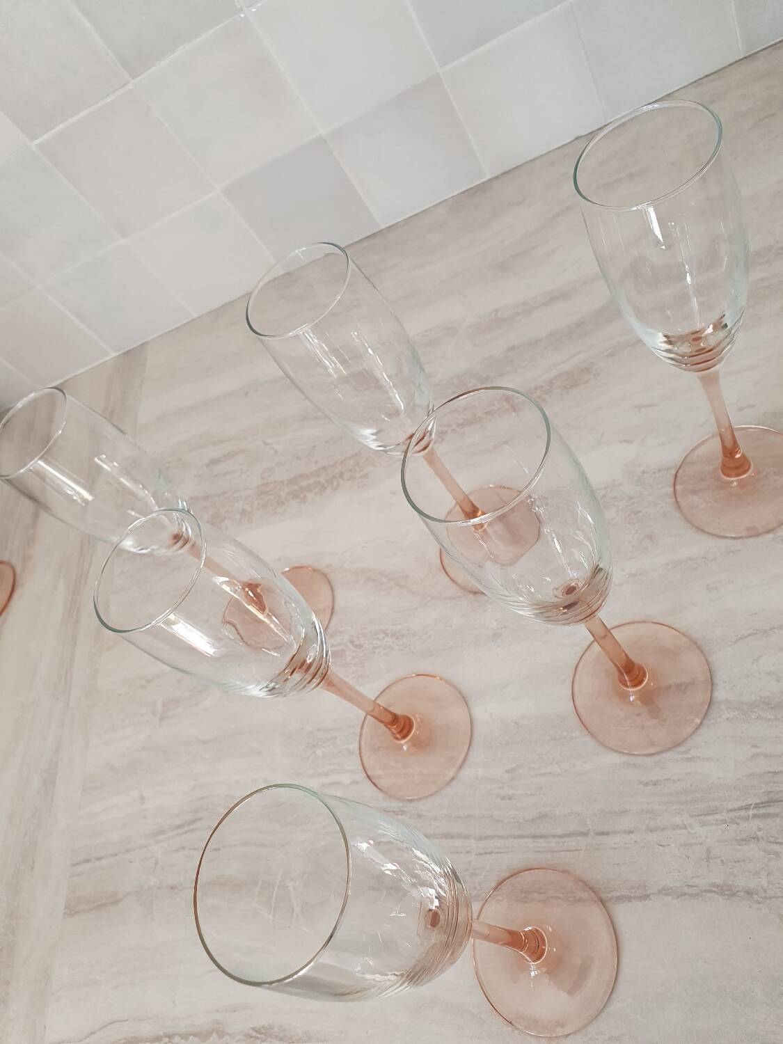 6 champagne flutes with pink stems