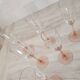 6 champagne flutes with pink stems
