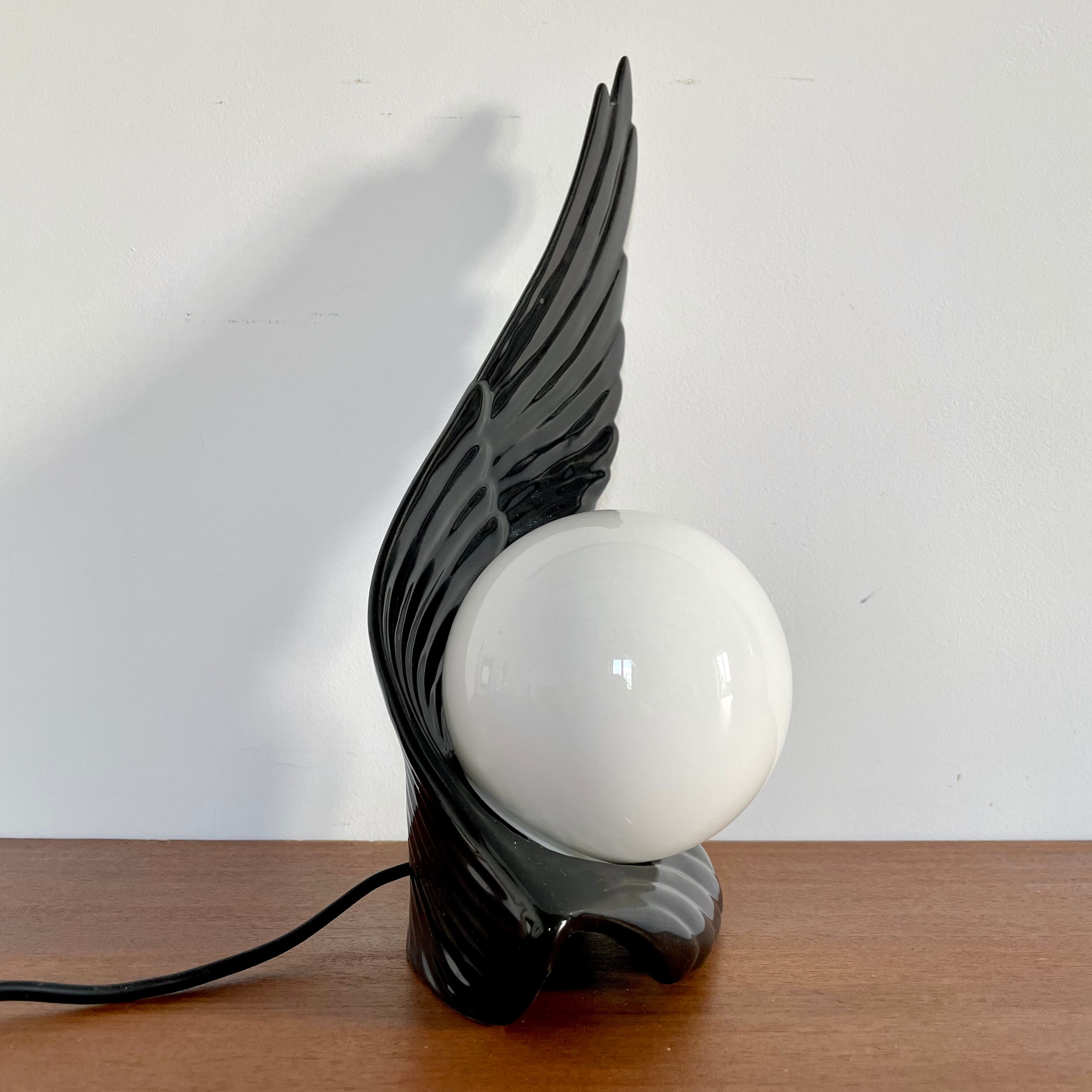 Ceramic wing and globe lamp