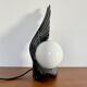 Ceramic wing and globe lamp
