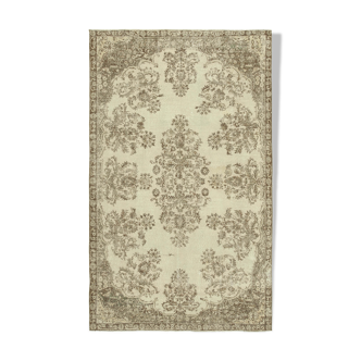 Handwoven vintage anatolian beige rug 187 cm x 307 cm