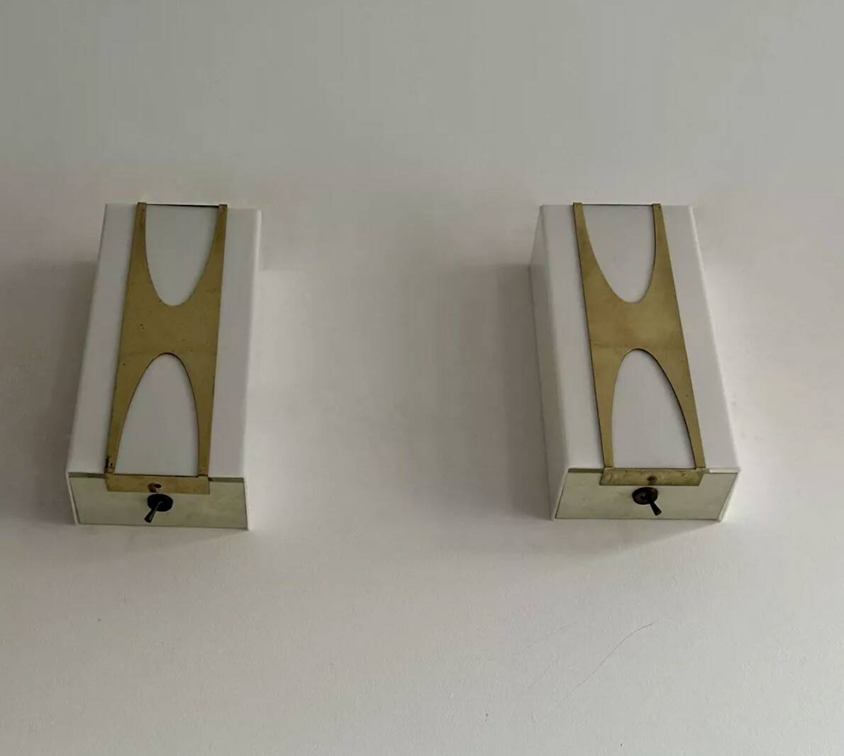 Pair of Loewy wall lights for Hilton, brass and Perspex, France 1965