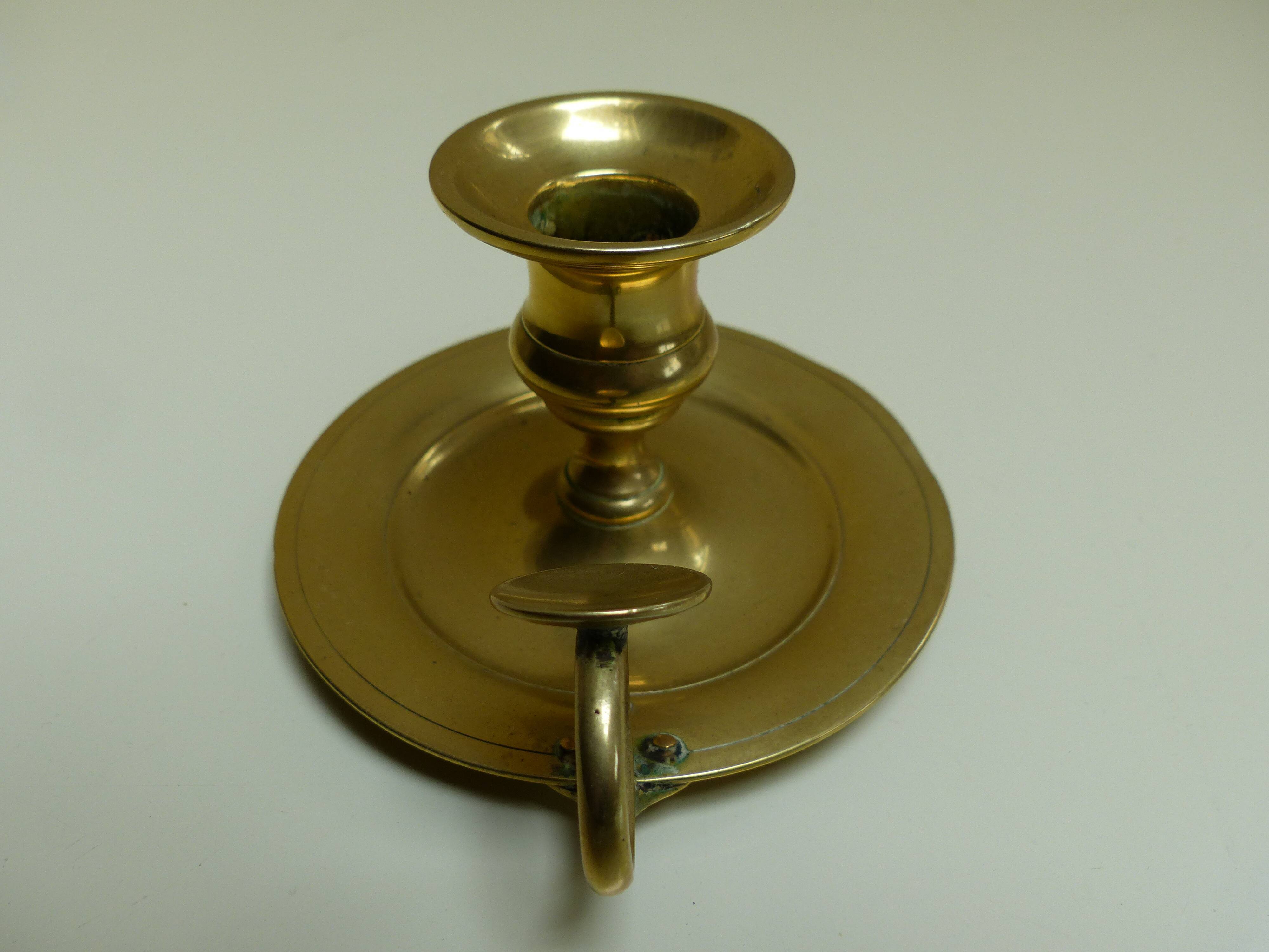 Golden brass candle holder
