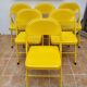 Ensemble de six chaises en métal pliantes jaunes Eurosit