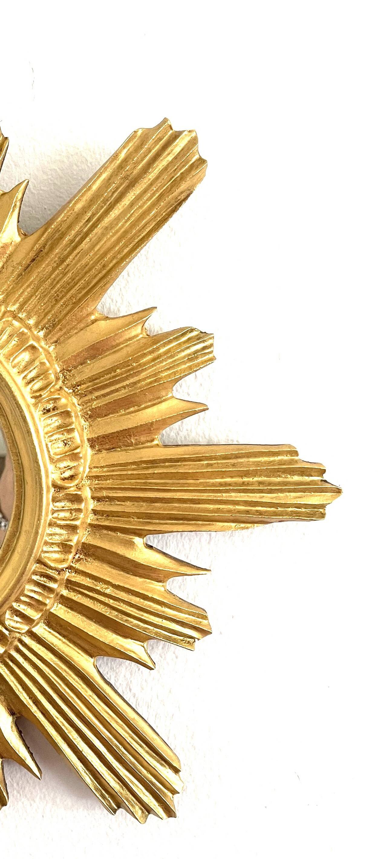 Golden carved wooden sun mirror — 42 cm