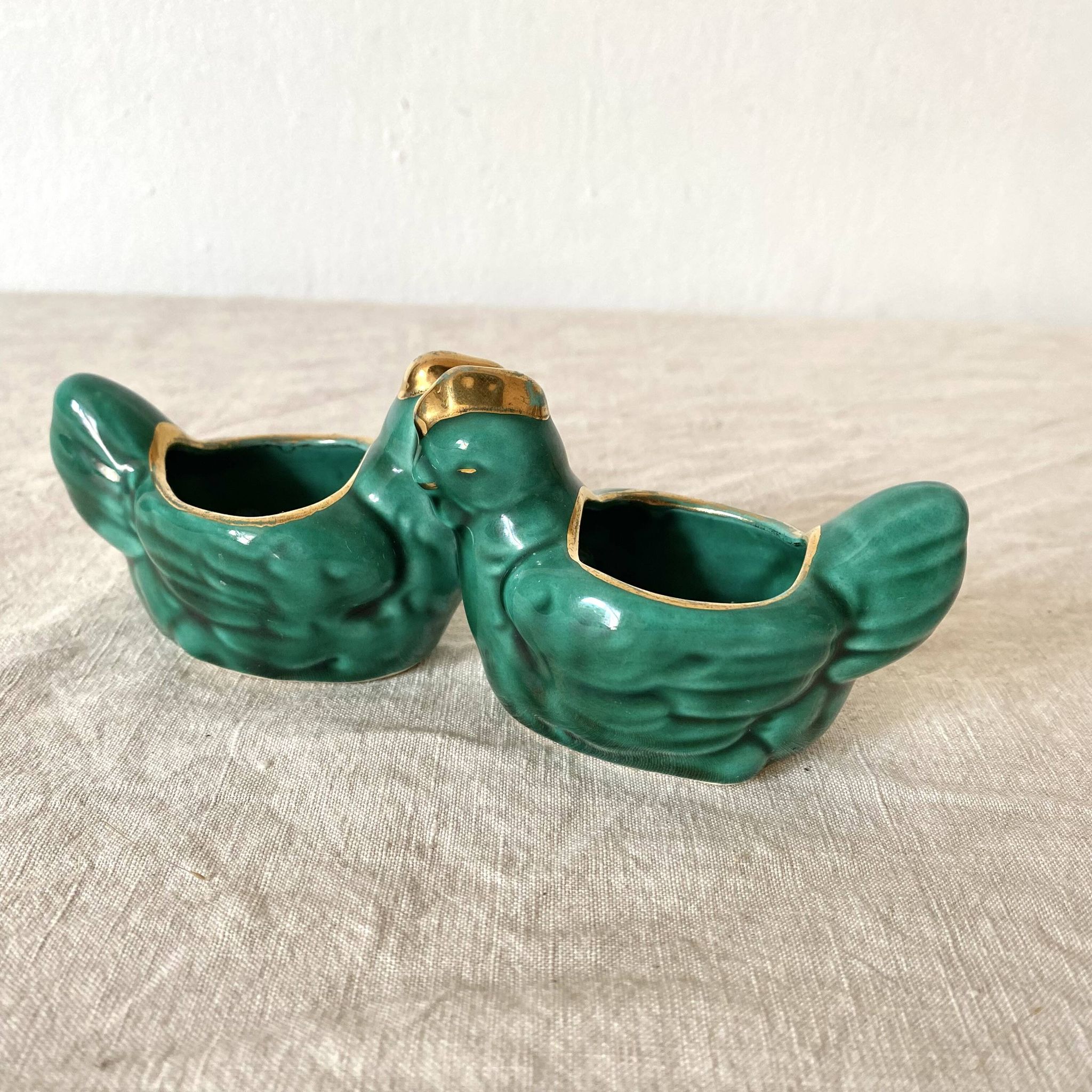 Salt and pepper shakers with chickens in slip