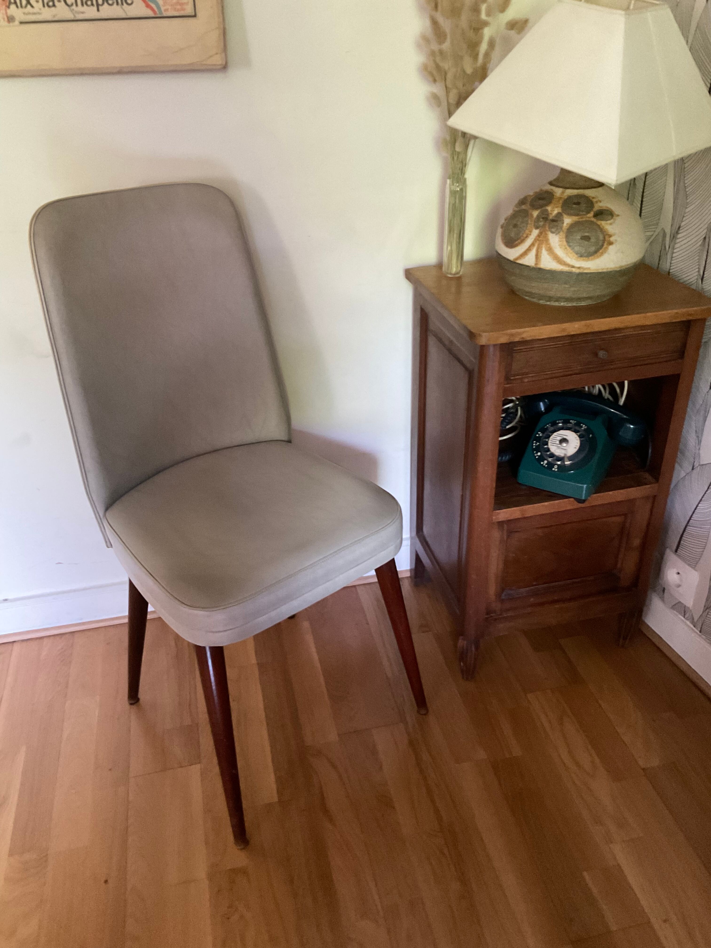 Pair of vintage mahogany and skai chairs