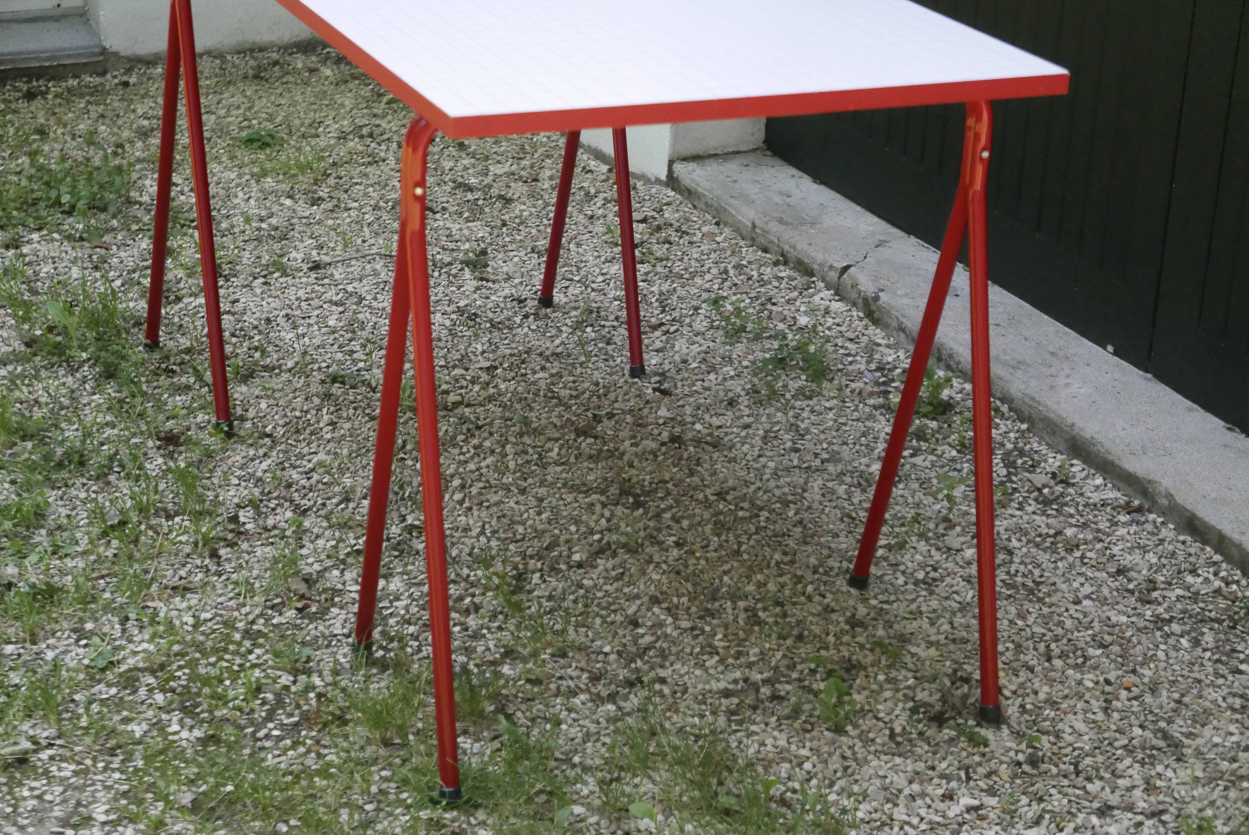 Desk with red trestles, white plaid tray, 80s