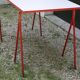 Desk with red trestles, white plaid tray, 80s