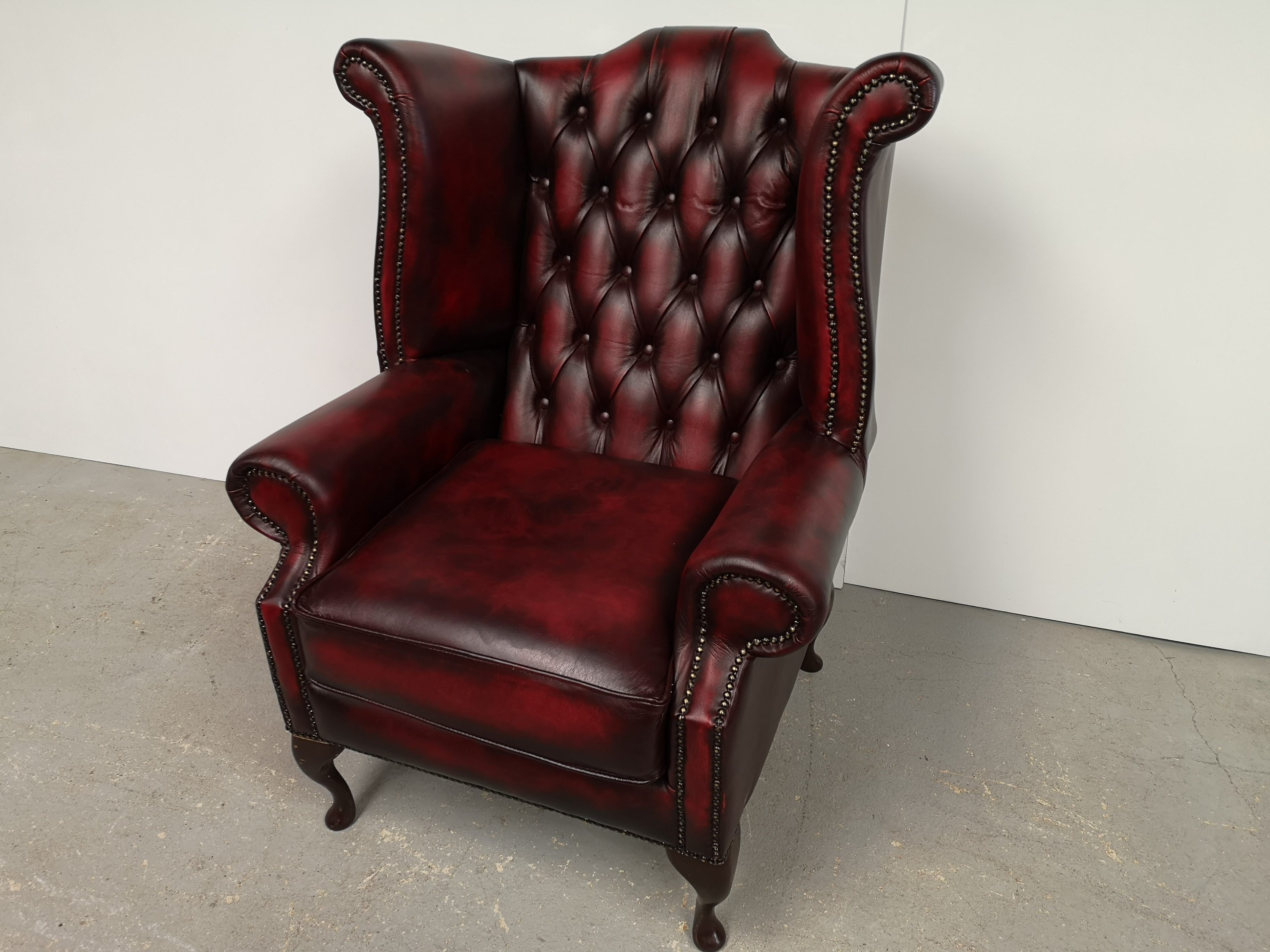 Burgundy chesterfield chair