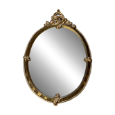 Oval mirror - wood and gilded stucco with decoration of