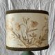 Old small green ceramic side lamp with dried flower lampshade