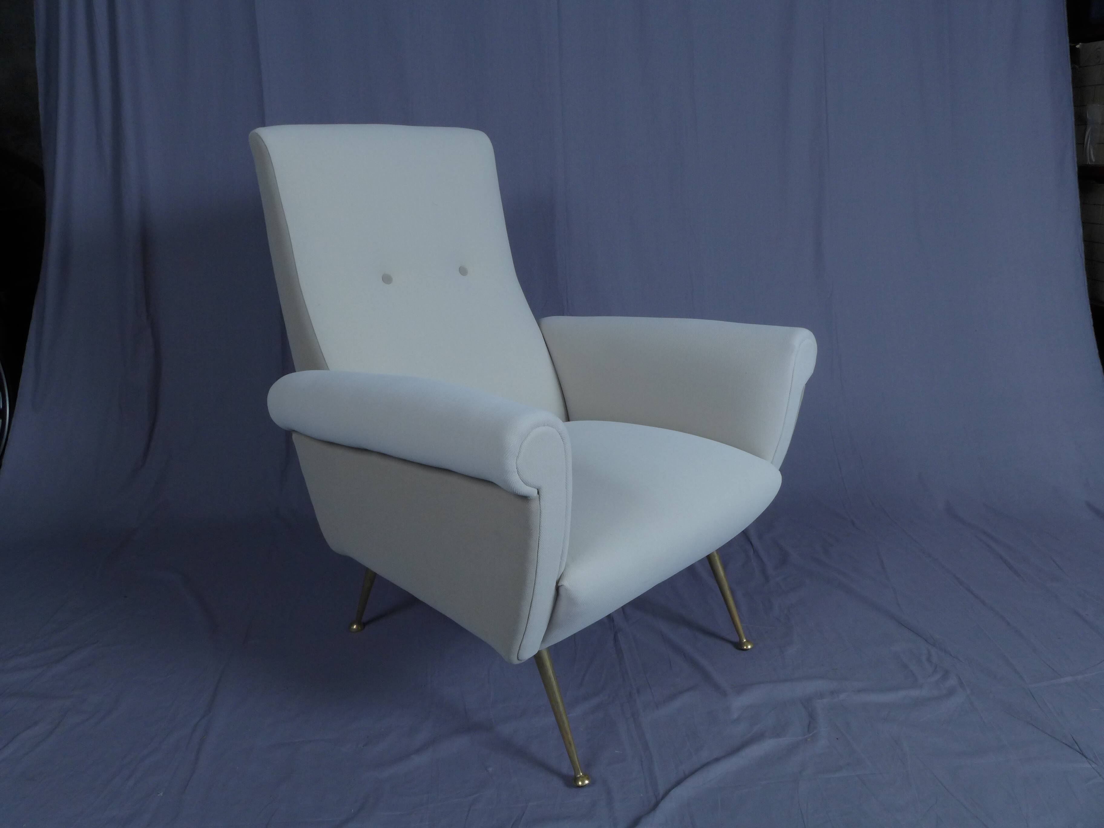 Pair of low armchairs in brass and textile. Italy 1950s