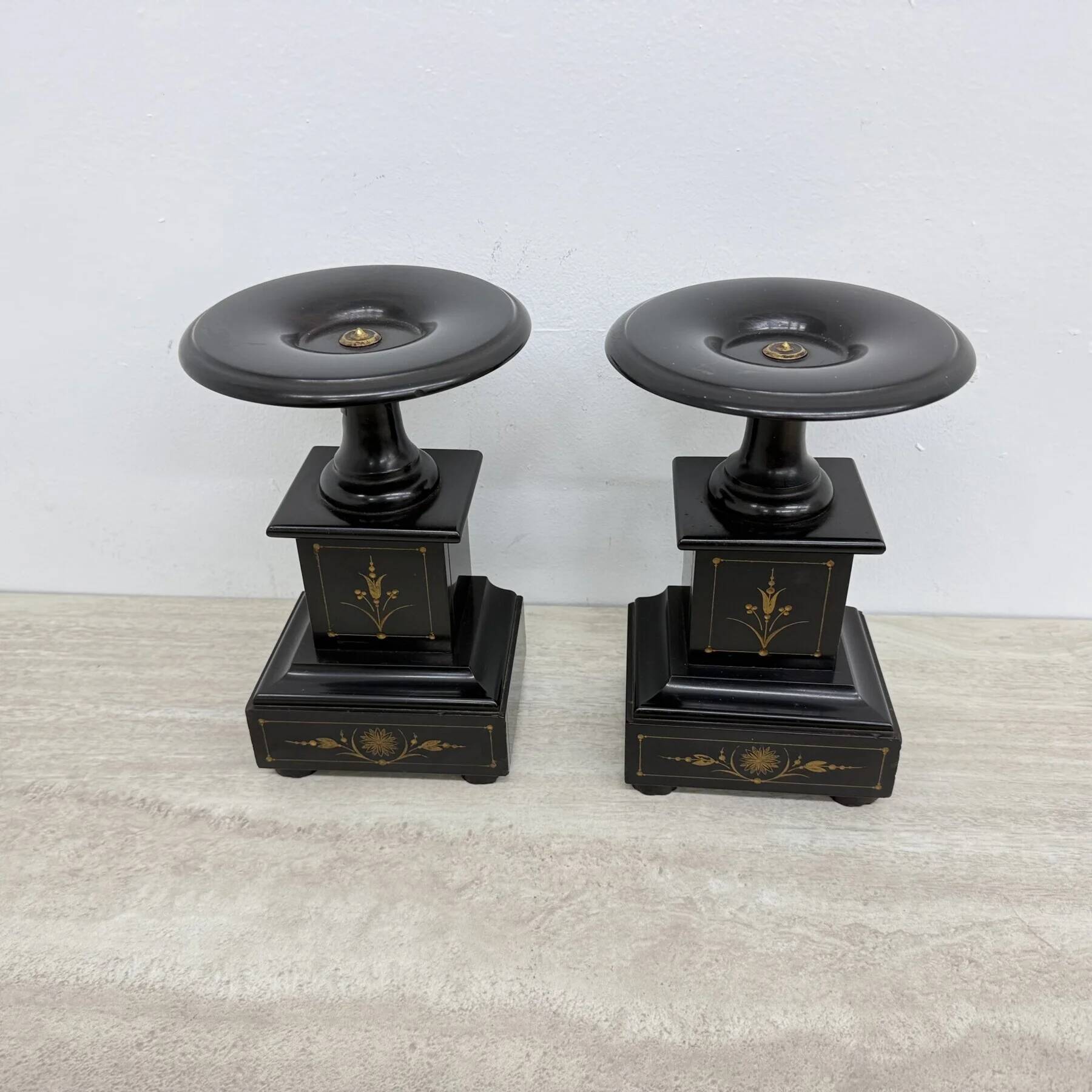 Antique French black marble cassoulets gilt decor pedestals neoclassical pair, 1900s