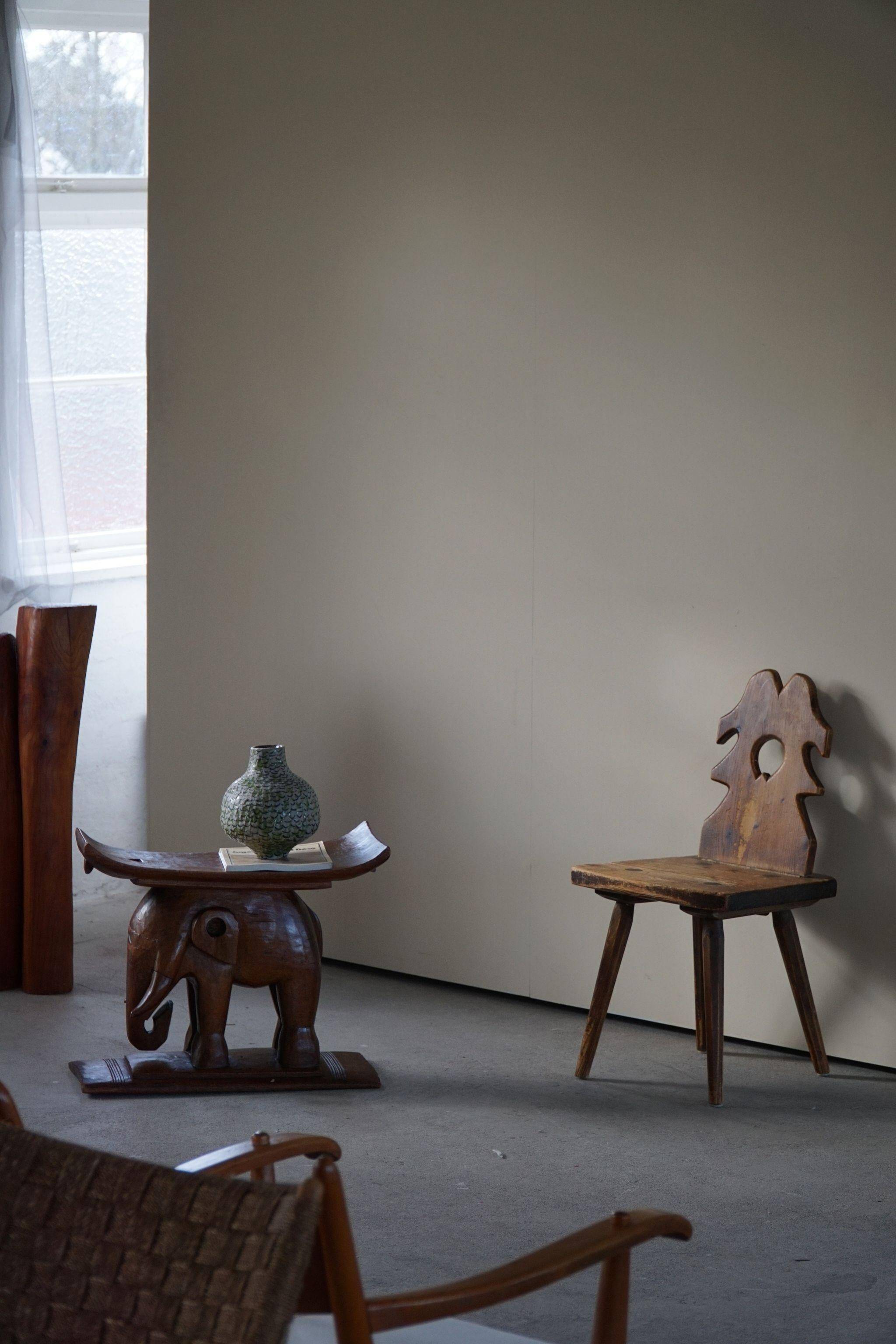 African elephant stool in carved wood, mid-century in Wabi Sabi style, 1940s.