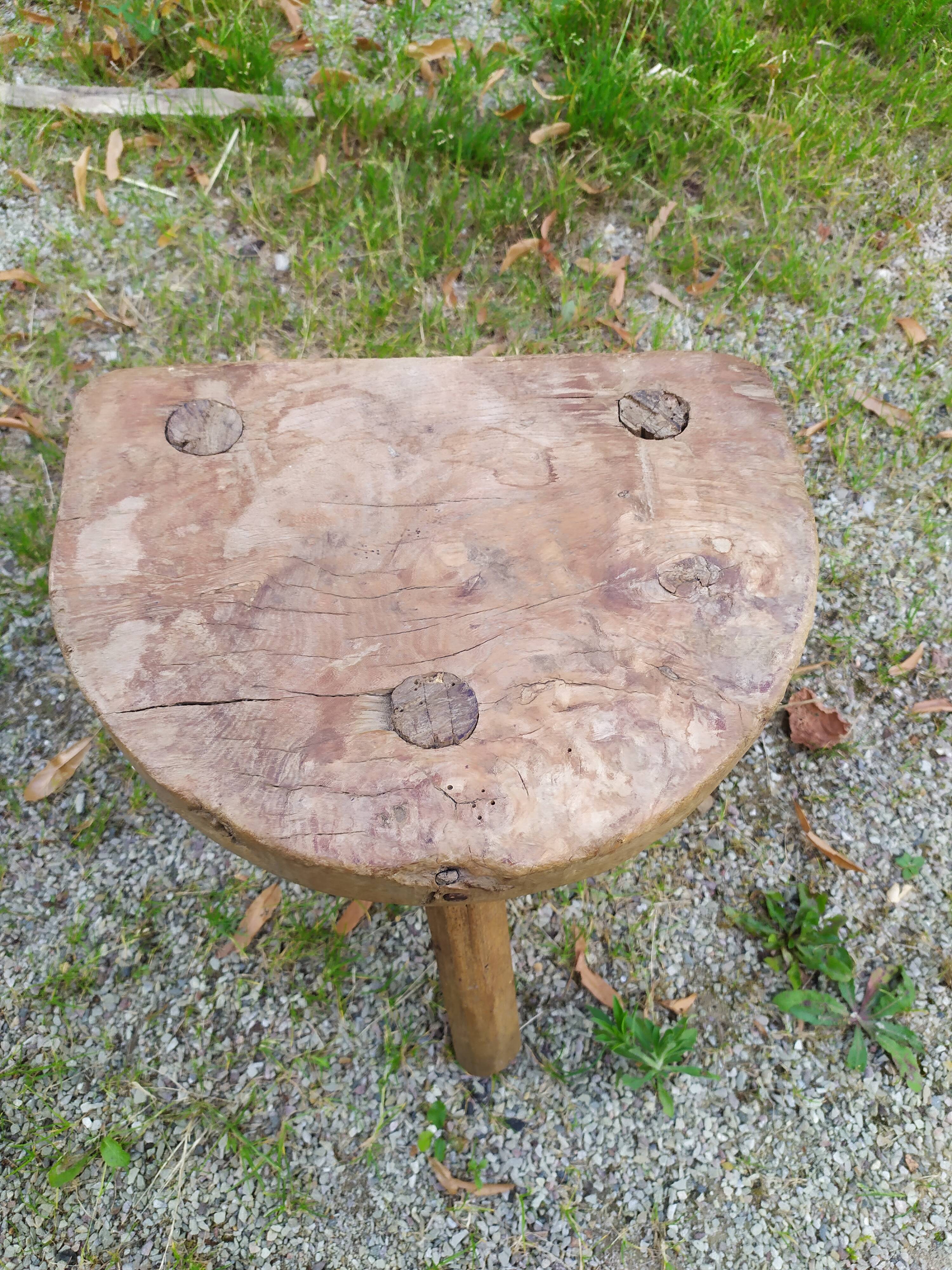 Tripod stool in raw wood