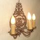 French triple wall sconce in wrought iron, early 20th century.