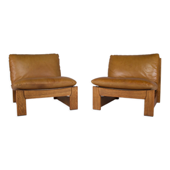 Pair of cognac leather chairs