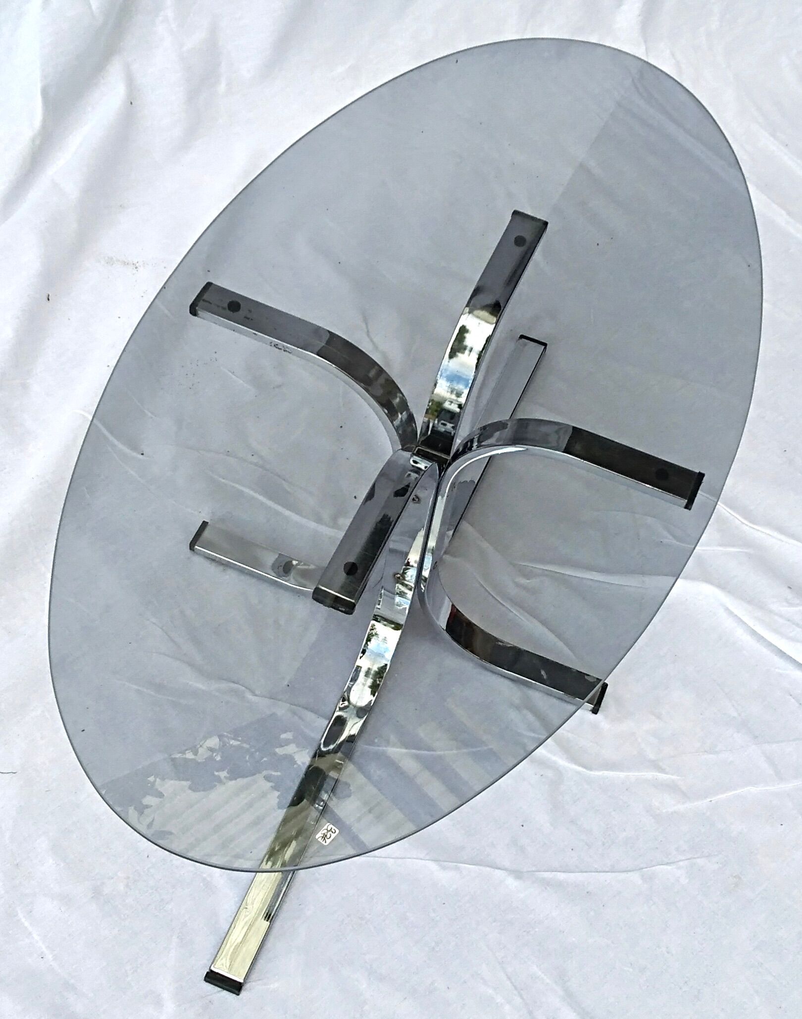 Oval glass coffee table smoked glass chromed metal