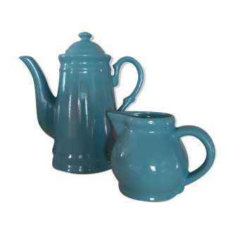 Blue ceramic coffee maker and milk jug