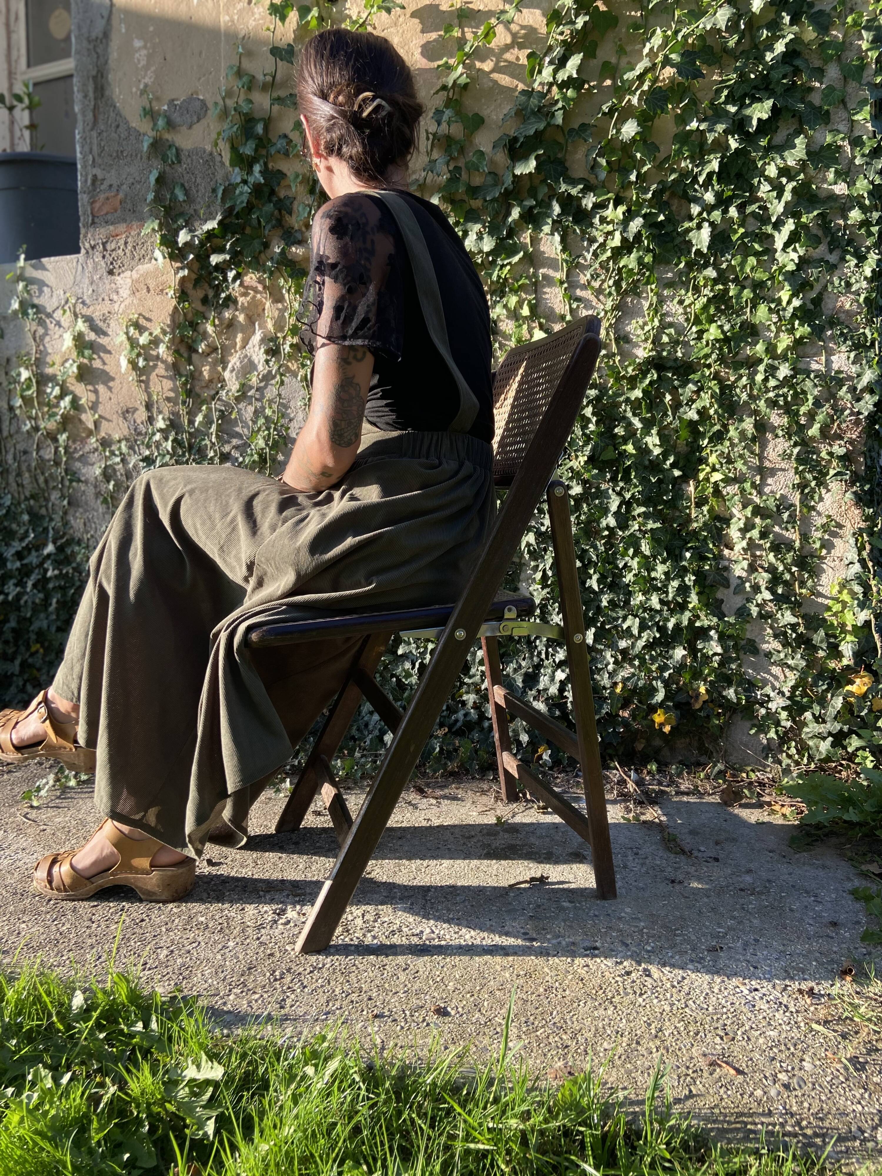 Folding chair in wood and cane.