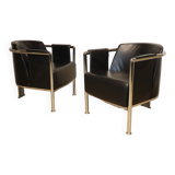 Pair of armchairs in synthetic leather and chromed metal, 1970
