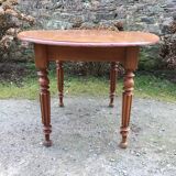 Table ovale ancienne en cerisier pieds parapluie
