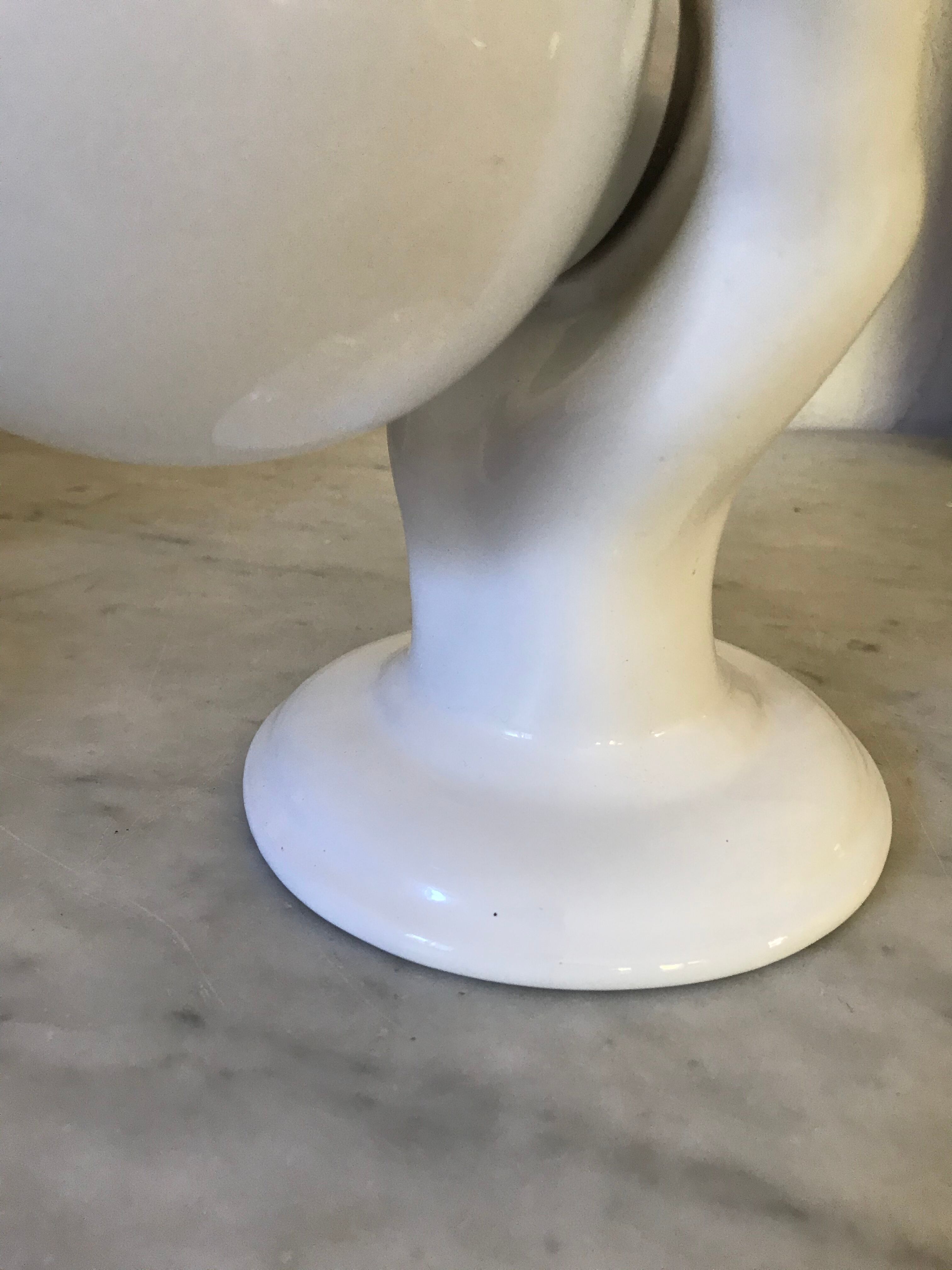 Ceramic hand and opaline sconce