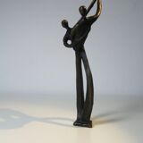 Tanned sculpture, "dancing couple". Signed M.N