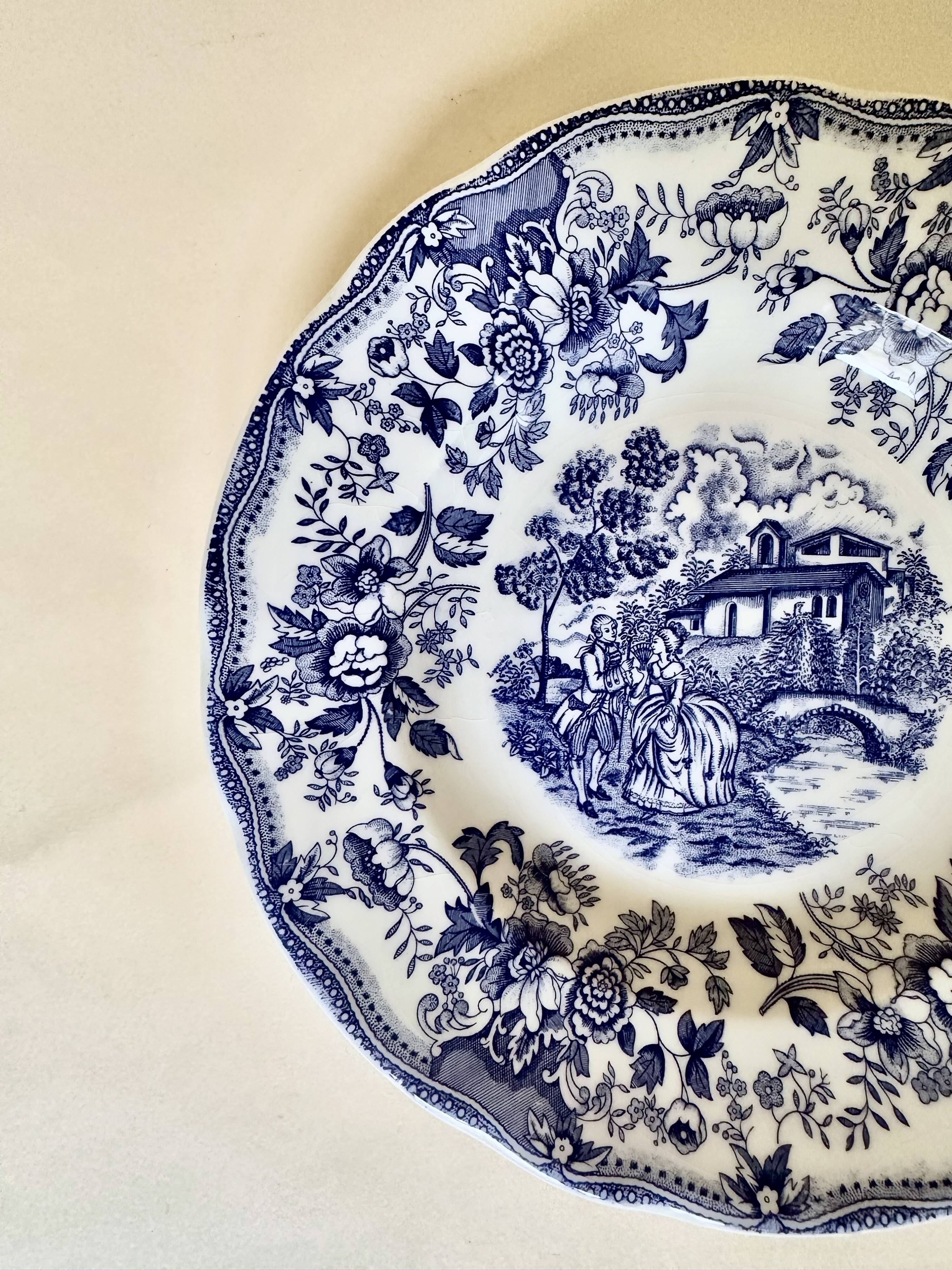 Set of five English deep plates, made of ironstone ceramic, romantic scene.