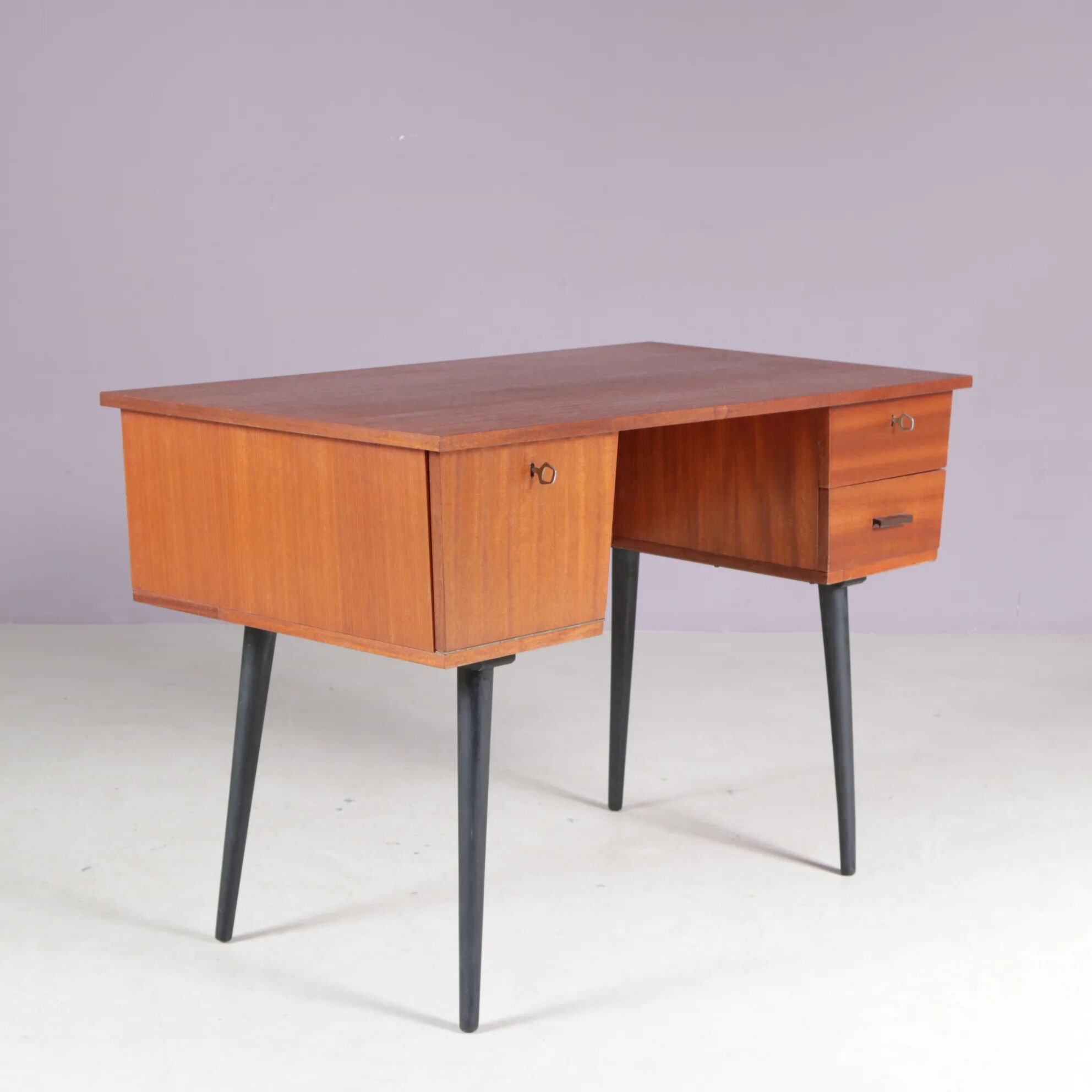 1950s small teak desk on black wooden legs Netherlands