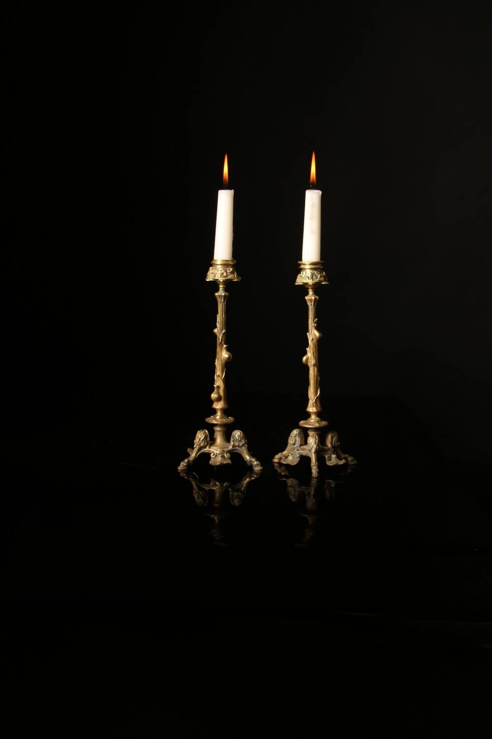 Pair of tripod candlesticks by Paul-Auguste Gagné (19th century)