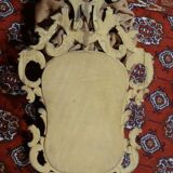 Carved and gilded wooden mirror with gold leaf 46 x 103 cm