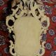 Carved and gilded wooden mirror with gold leaf 46 x 103 cm