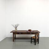 Authentic French farmhouse table from 1890 in solid oak with two drawers.