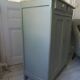 Small vintage Parisian sideboard with 2 doors and 2 drawers, enhanced in verdigris
