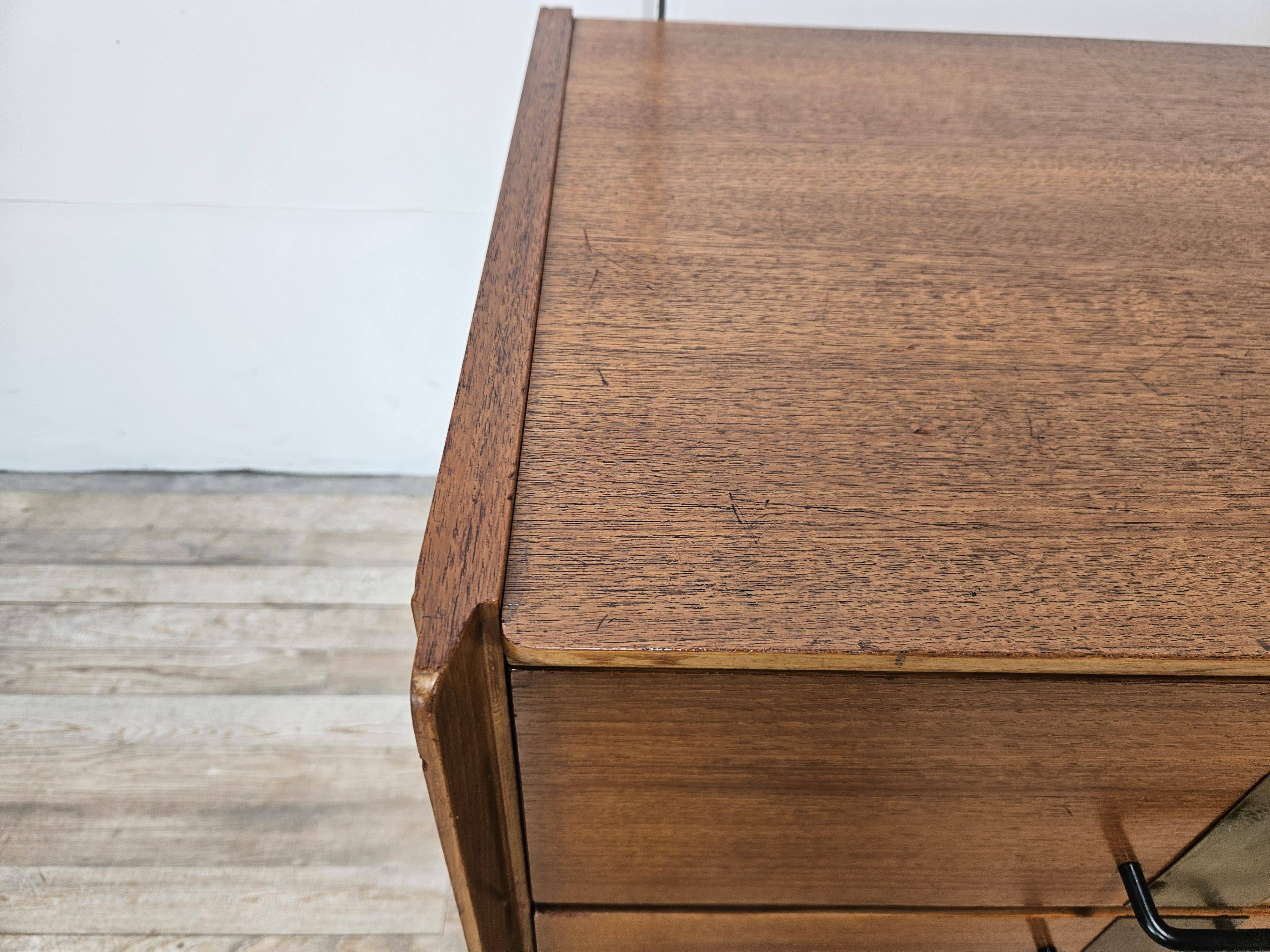 1960s walnut chest of drawers with iron and brass details