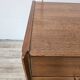 1960s walnut chest of drawers with iron and brass details