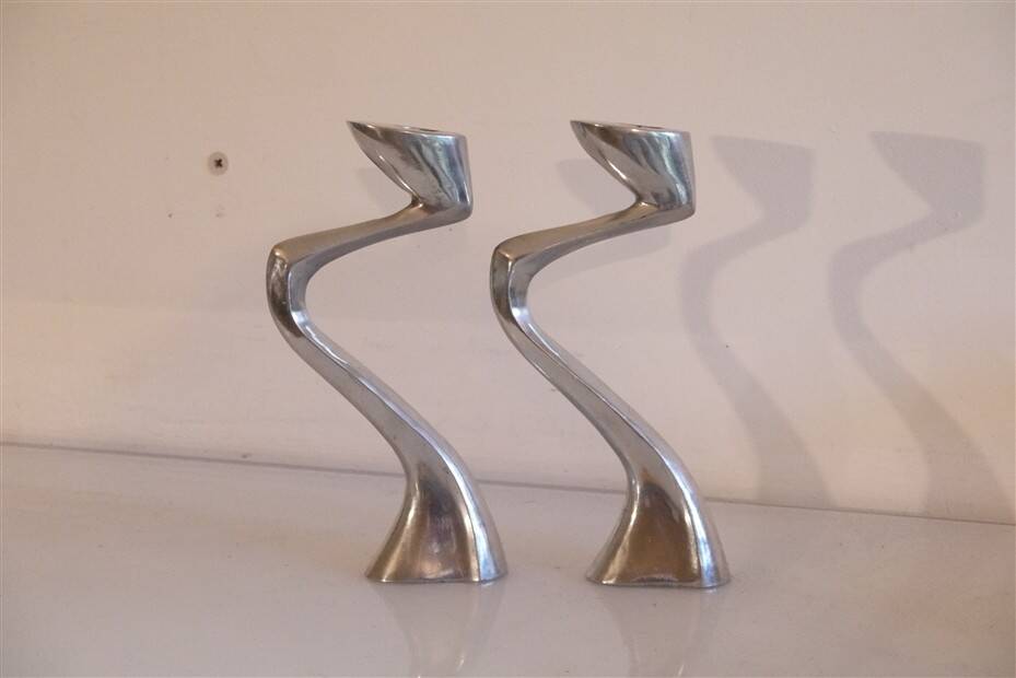 Pair of aluminium cast candle holders