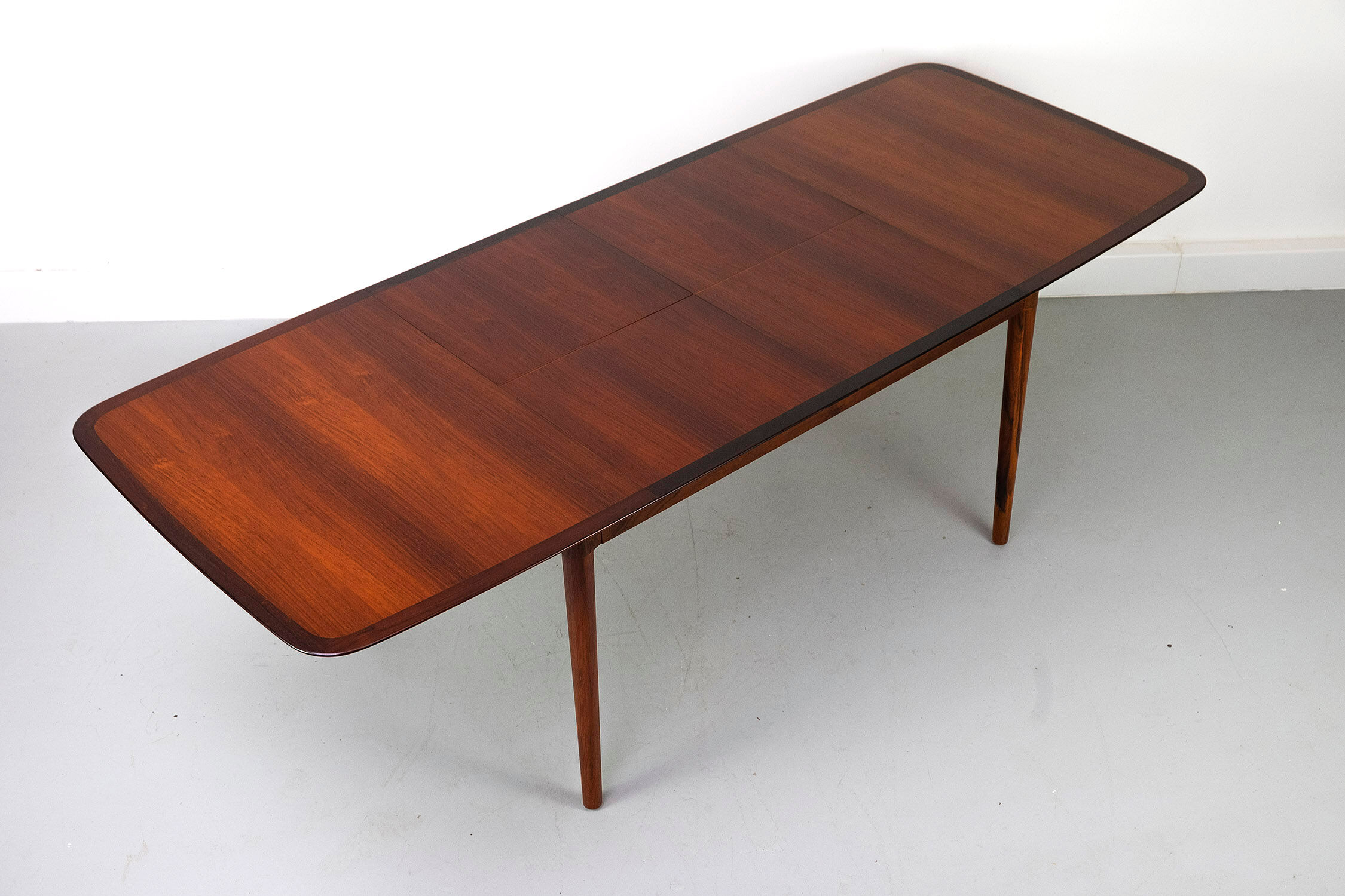 Extendable wooden dining table, manufactured by Lübke, Germany
