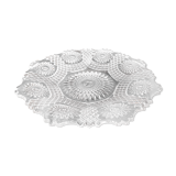 Vintage pressed glass plate with rosette design, octagonal rim, star pattern reminiscent of mandala
